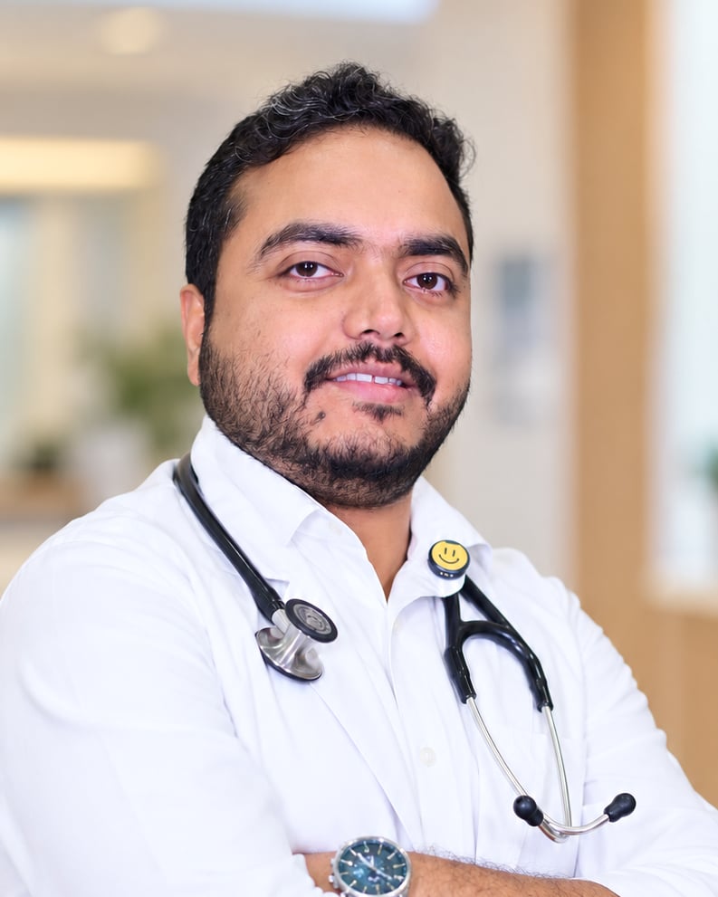 Dr. Tamoghna Das, physician at Medcare Diabetes & Obesity Clinic, Bongaigaon, in a white coat with a stethoscope